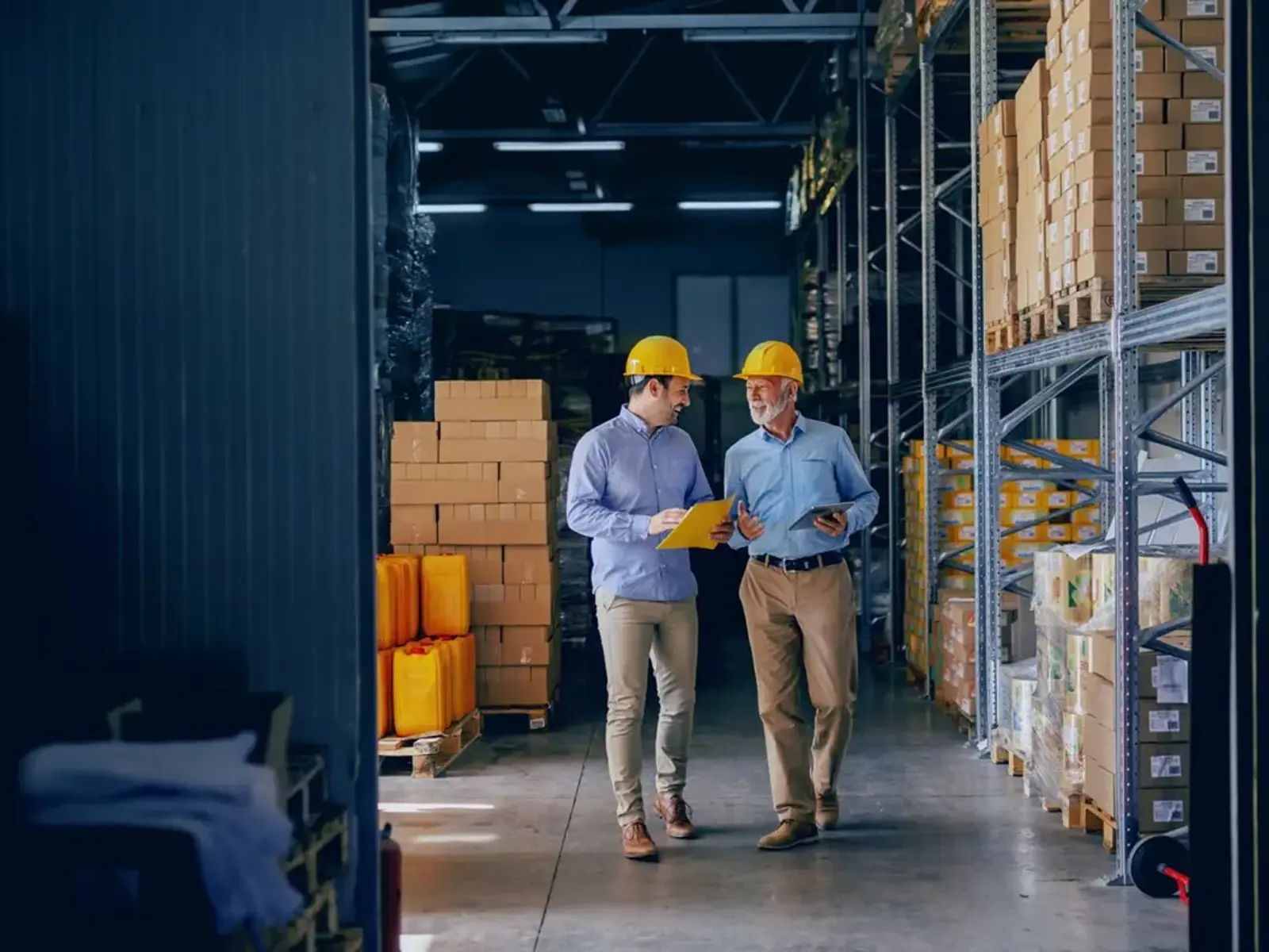 warehouse workers talking