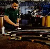 guy fixing hose